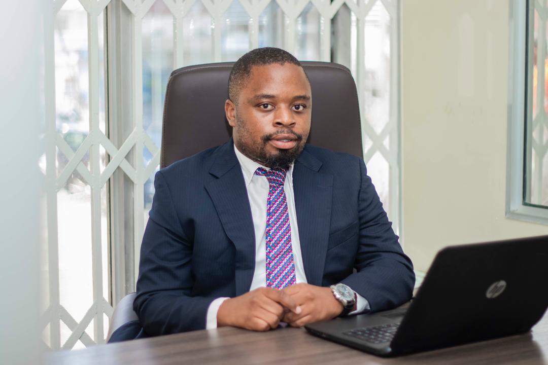 Portrait of James Kamvulumvulu